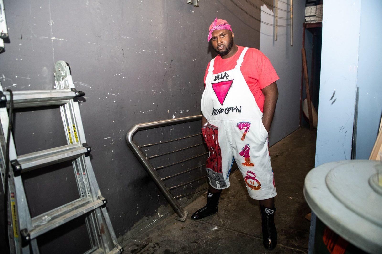 Man stands in a backstage area