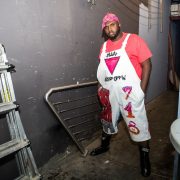 Man stands in a backstage area